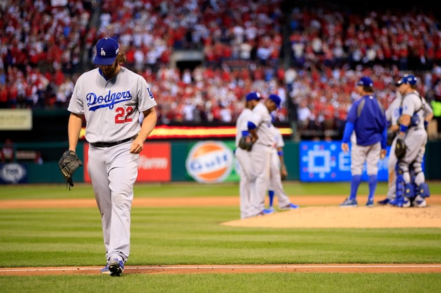 ST LOUIS, MO - OCTOBER 07: Clayton Kershaw #22 of the Los Angeles Dodgers exits the game in the seventh inning after giving up a three run home run against the St. Louis Cardinals in Game Four of the National League Divison Series at Busch Stadium on October 7, 2014 in St Louis, Missouri.