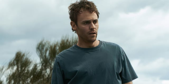 Charlie Vickers looking concerned with messy hair in The Survivors