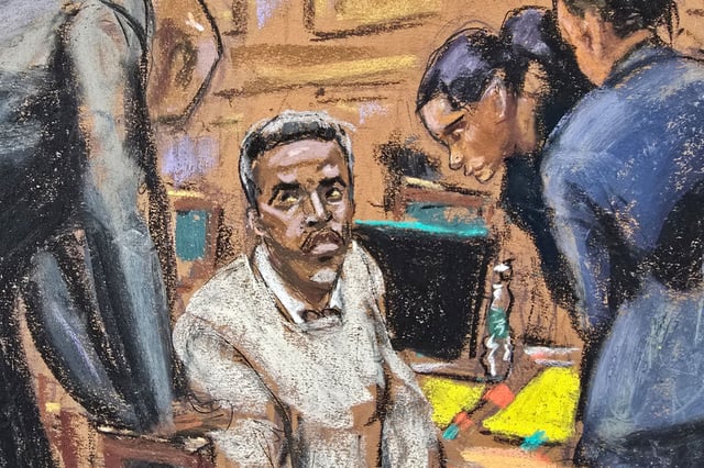 Sean "Diddy" Combs confers with his lawyers after meeting with U.S. District Judge Arun Subramanian in his chambers on June 9.
