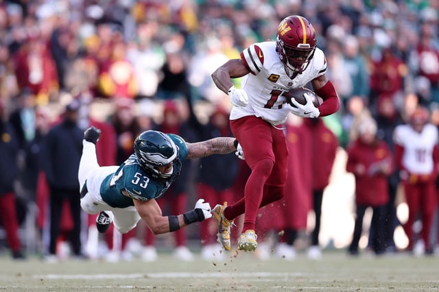 Jan 26, 2025; Philadelphia, PA, USA; Washington Commanders wide receiver Terry McLaurin (17) evades the tackle of Philadelphia Eagles linebacker Zack Baun (53) during the first half in the NFC Championship game at Lincoln Financial Field. Mandatory Credit: Bill Streicher-Imagn Images/File Photo