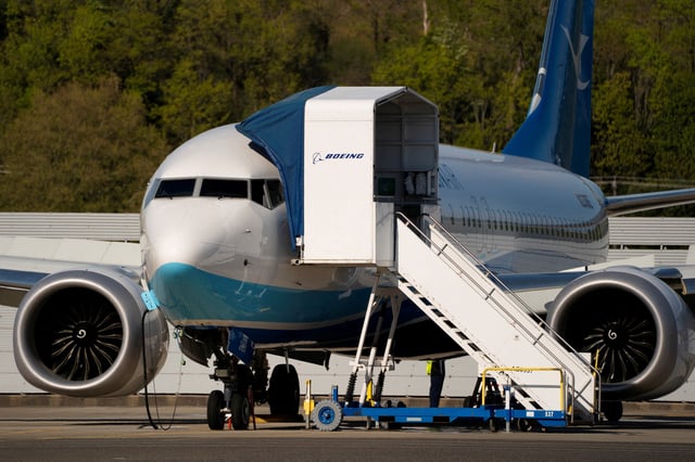 A Boeing 737 MAX 8, the first jet intended for use by a Chinese airline to be returned to its manufacturer, sits parked at Boeing Field, as trade tensions escalate over U.S. tariffs with China, in Seattle, Washington, U.S. April 22, 2025. REUTERS/David Ryder/File Photo