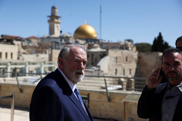 U.S. Ambassador to Israel Mike Huckabee looks on during the day he visits the Western Wall, Judaism's holiest prayer site, in Jerusalem's Old City, April 18, 2025. REUTERS/Ronen Zvulun/File photo