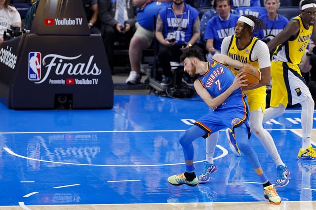 Jun 8, 2025; Oklahoma City, Oklahoma, USA; Oklahoma City Thunder forward Chet Holmgren (7) looks to move to the basket past Indiana Pacers center Myles Turner (33) during the third quarter of game two of the 2025 NBA Finals at Paycom Center. Mandatory Credit: Alonzo Adams-Imagn Images