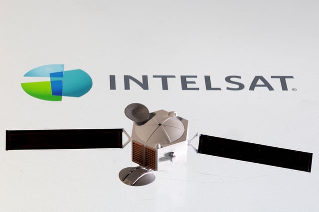 Satellite model is placed on Intelsat logo in this picture illustration taken April 4, 2022. REUTERS/Dado Ruvic/Illustration/File Photo