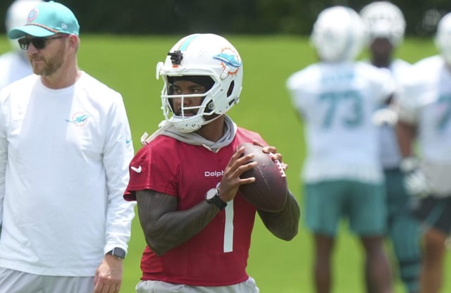Miami Dolphins quarterback Tua Tagovailoa (1) runs drills during an NFL football practice, Wednesday, May 28, 2025, in Miami Gardens, Fla. (AP Photo/Marta Lavandier)