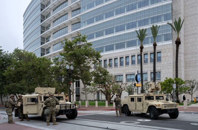 The California National Guard arrives to stand watch outside the Ronald Reagan Federal Building and Courthouse in Santa Ana on Tuesday, June 10, 2025, after Monday’s protests against President Trump’s ICE raids resulted in violence.(Photo by Mindy Schauer, Orange County Register/SCNG)