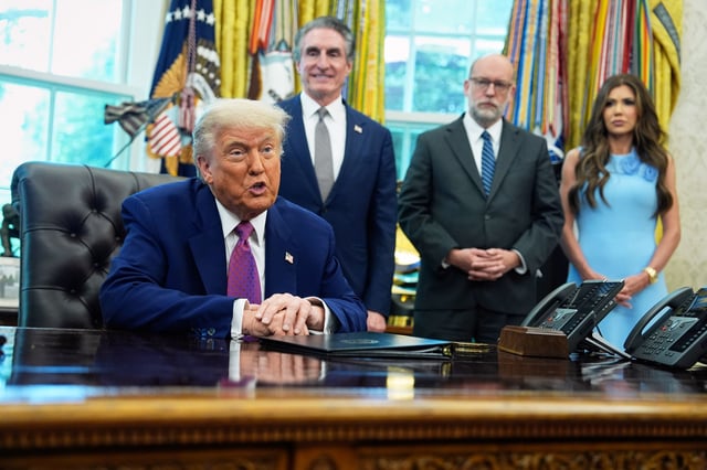 President Trump speaking in the Oval Office today. Behind him are, from left, Doug Burgum, the interior secretary, Russell Vought, director of the Office of Management and Budget, and Kristi Noem, homeland security secretary