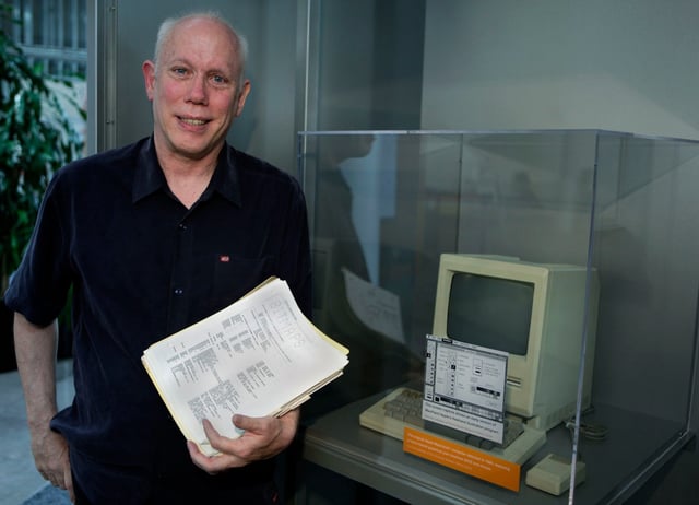 Bill Atkinson developed MacPaint. When he left Apple he kept a copy of the source code for MacPaint as a memento of his days making history. It sat in his Portola Valley garage for 14 years, until a series of conversations led to him donating it to the Computer History Museum, in Mountain View, as seen in front of the original Macintosh machine on display on Tuesday , Sept. 14, 2010. (Karen T. Borchers/Mercury News)