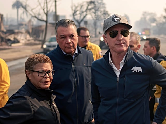 LOS ANGELES, CALIFORNIA - JANUARY 8: California Governor Gavin Newsom and Los Angeles Mayor Karen Bass tour the downtown business district of Pacific Palisades as the Palisades Fire continues to burn on January 8, 2025 in Los Angeles, California. (Photo by Eric Thayer/Getty Images)