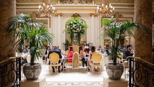The Ritz’s Palm Court dining room serves its renowned afternoon tea