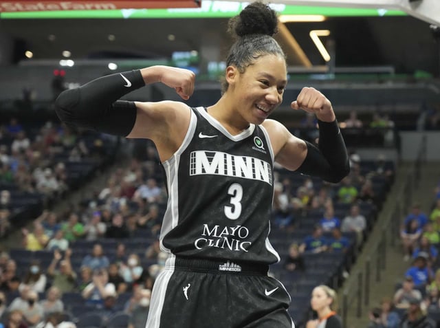 Minnesota Lynx forward Aerial Powers (3) interacts with fans after a play during the second half of a WNBA basketball game against the Chicago Sky in Minneapolis, Wednesday, July 6, 2021. The Lynx won 81-78.