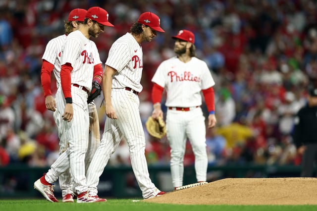 Aaron Nola #27 of the Philadelphia Phillies exits the game in the fifth inning against the Arizona Diamondbacks during Game Six of the Championship Series at Citizens Bank Park on October 23, 2023 in Philadelphia.