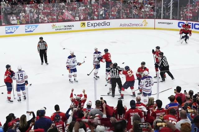 FILE - Toy rats litter the ice as the Edmonton Oilers and Florida Panthers scuffle at the end of the third period in Game 3 of the NHL hockey Stanley Cup Finals in Sunrise, Fla., Monday, June 9, 2025. 