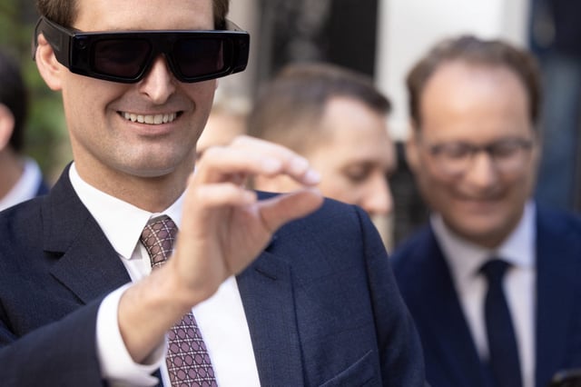 Snap cofounder and CEO Evan Spiegel wears the the developer version of the Spectacle Augmented Reality glasses. Images of the new &#34;lightweight&#34; version of the Specs have yet to be released.