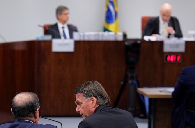 Former Brazilian President Jair Bolsonaro, attends Brazil's Supreme Court trial over alleged coup attempt, as Brazil's Supreme Court Minister Alexandre de Moraes leads the proceedings, in Brasilia, Brazil June 10, 2025. REUTERS/Diego Herculano