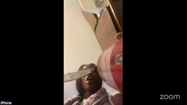Michigan woman gets kicked off court Zoom call after she appears wearing a robe and making a sandwich, video shows.