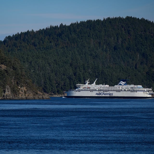 The BC Ferries vessel Spirit of Vancouver Island passes between Mayne Island and Galiano Island while travelling from Swartz Bay to Tsawwassen, B.C., on Wednesday, Sept. 20, 2023. THE CANADIAN PRESS/Darryl Dyck