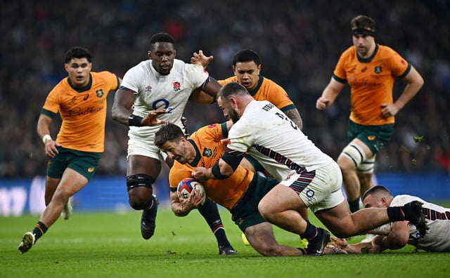Rugby Union - Autumn Internationals - England v Australia - Allianz Stadium Twickenham, London, Britain - November 9, 2024 Australia's Jake Gordon in action with England's Will Stuart REUTERS/Dylan Martinez/File Photo