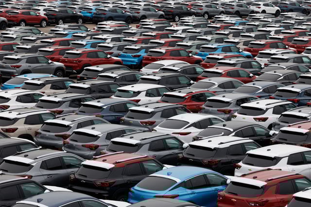 General Motors vehicles are ready for export in South Korea on May 20. The company's CEO, Mary Barra, told CNN earlier new tariffs would cost the company up to $5 billion.