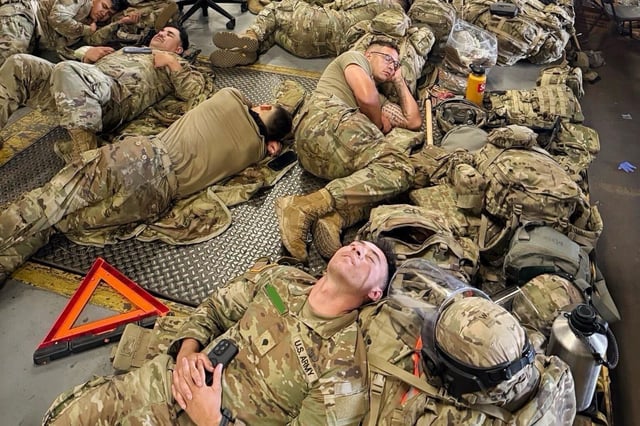 Photos obtained by the Chronicle show California National Guard troops deployed by the White House to Los Angeles packed together in what appear to be federal building basements or loading docks. The source who provided the photo said they redacted the name of one soldier that appeared in this photo.