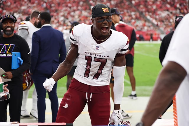 Terry McLaurin #17 of the Washington Commanders reacts after a score during the fourth quarter against the Arizona Cardinals at State Farm Stadium on September 29, 2024 in Glendale, Arizona.