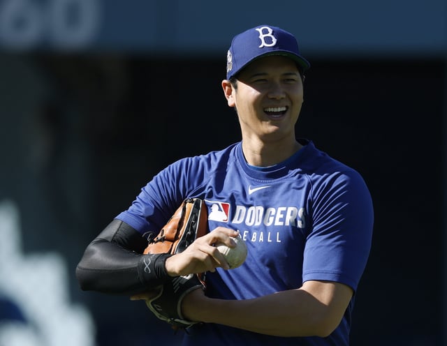 LOS ANGELES, CALIFORNIA - JUNE 02: Shohei Ohtani #17 of the Los Angeles Dodgers smiles on the field before the game against the New York Mets at Dodger Stadium on June 02, 2025 in Los Angeles, California.