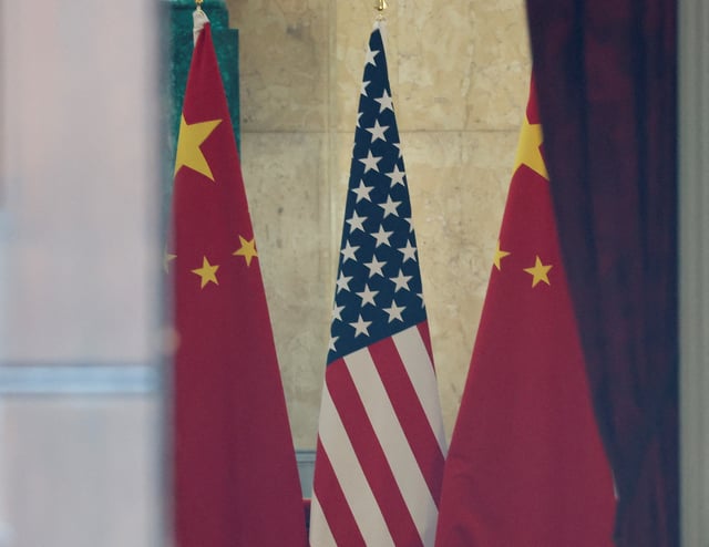 U.S. and China flags are pictured at Lancaster House, on the second day scheduled for trade talks between the U.S. and China, in London, Britain, June 10, 2025. REUTERS/Toby Melville