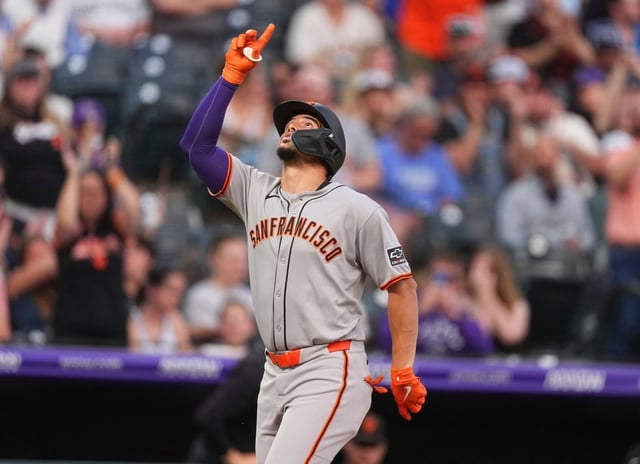 San Francisco Giants’ Willy Adames gestures as he crosses home plate after hitting a solo home run off Colorado Rockies starting pitcher Carson Palmquist in the fifth inning of a baseball game Tuesday, June 10, 2025, in Denver. (AP Photo/David Zalubowski)
