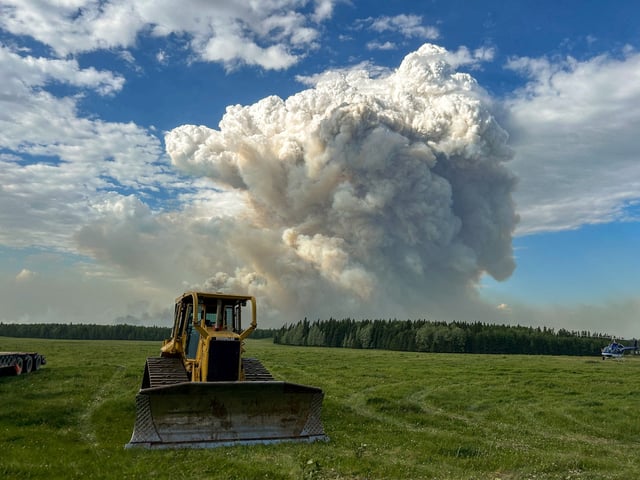 Smoke rises from the Hubert Lake wildfire WWF023, which forced the evacuation of the Hubert Lake Provincial Park area west of Fawcett, Alberta, Canada in an aerial photograph May 29, 2025.  Alberta Wildfire/Handout via REUTERS/File Photo
