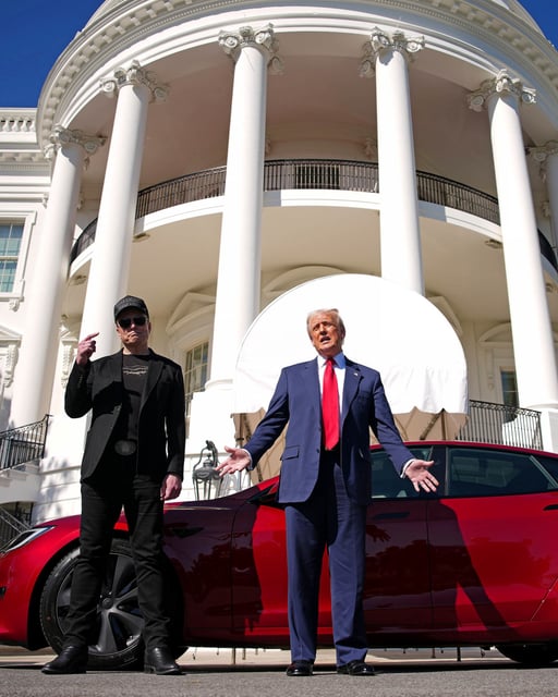 President Donald Trump and White House Senior Advisor, Tesla and SpaceX CEO Elon Musk deliver remarks next to a Tesla Model S on the South Lawn of the White House on March 11, 2025 in Washington, DC. 