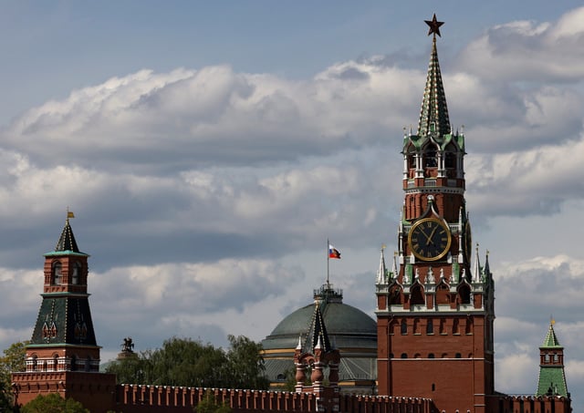 The Russian flag flies on the dome of the Kremlin Senate building behind Spasskaya Tower, in central Moscow, Russia, May 4, 2023. REUTERS/Stringer/ File Photo