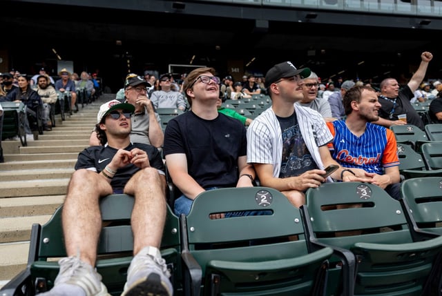 Vincent Skokal, from left, sits with St. Rita High School friends Matthew Mariotti, Jack Maza and Nick Stawczyk on June 5, 2025, in Row 19 of Section 140 to watch the White Sox face the Tigers at Rate Field. Skokal’s grandfather, Ed Schmit, was in his longtime family seats during Game 1 of the 2005 World Series when he invited his friend, the Rev. Robert Prevost, now Pope Leo XIV, to sit next to him in Seat 2 where Mariotti is sitting. (Brian Cassella/Chicago Tribune)