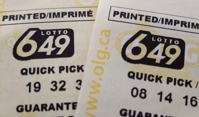 An Ontario woman is suing her former common-law partner for allegedly denying that the couple had won $6 million in a provincial lottery before claiming the full prize for himself. A pair of Lotto 649 tickets are pictured in Toronto on October 17, 2015. 