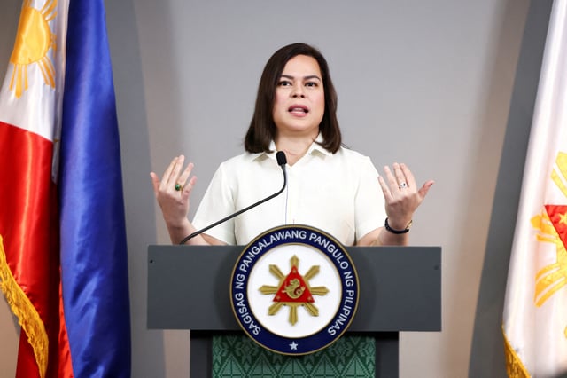 Philippine Vice President Sara Duterte delivers a statement following her impeachment by the lower house of the Congress, in her office at Mandaluyong City, Metro Manila, Philippines, February 7, 2025. REUTERS/Eloisa Lopez/File Photo