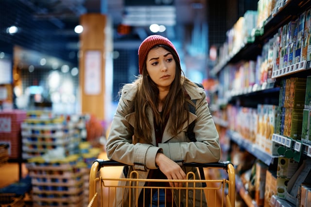 Stock image/file photo: A woman shopping for groceries.