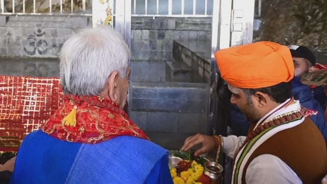 LG Manoj Sinha performing pooja at the Amarnath shrine on Wednesday