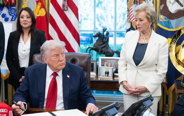 Donald Trump signs executive orders relating to higher education institutions, alongside US Secretary of Education Linda McMahon.
