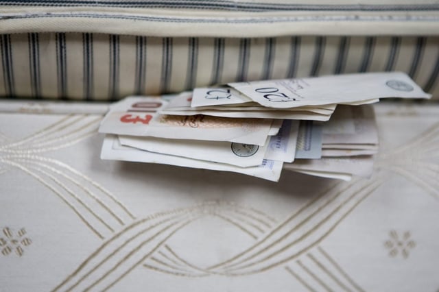 More people are stashing cash at home (Photo: Nousha/Getty)