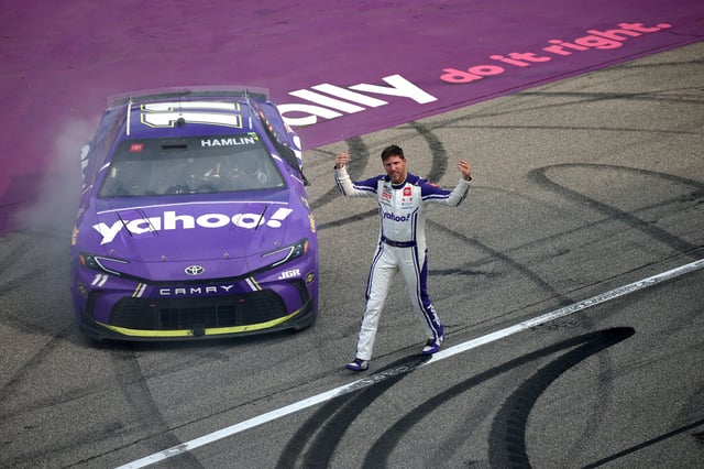 Denny Hamlin, driver of the #11 Yahoo! Toyota, celebrates after winning the NASCAR Cup Series FireKeepers Casino 400 at Michigan International Speedway on June 08, 2025 in Brooklyn, Michigan.