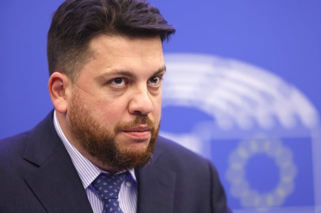 FILE - Leonid Volkov, chief of staff for the late Russian opposition leader Alexei Navalny watches a session of the European Parliament in Strasbourg, France, on Dec. 15, 2021. (AP Photo/Jean-Francois Badias, File)