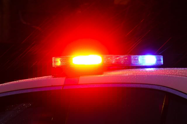 A police vehicle flashes its lights in Philadelphia, Monday, Jan. 17, 2022. This photo is unrelated to the Amber Alert.