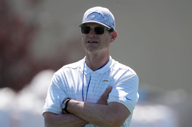 May 20, 2025; El Segundo, CA, USA; Los Angeles Chargers coach Jim Harbaugh looks on during offseason workouts at The Bolt. Mandatory Credit: Kirby Lee-Imagn Images/File Photo