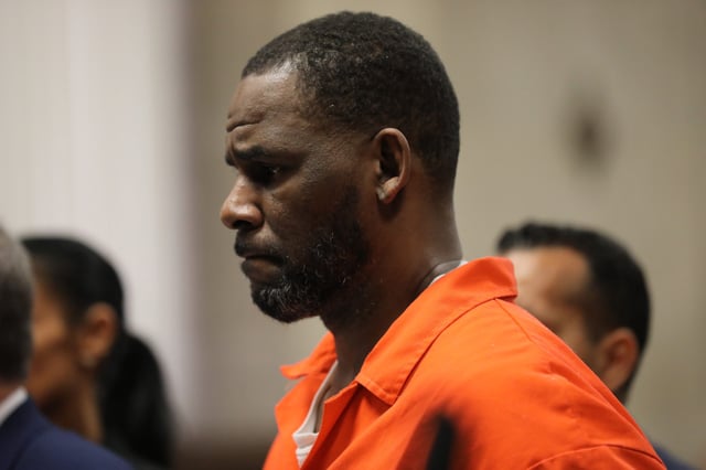 Singer R. Kelly appears during a hearing at the Leighton Criminal Courthouse on Sept. 17, 2019, in Chicago. Kelly is facing multiple sexual assault charges and is being held without bail.