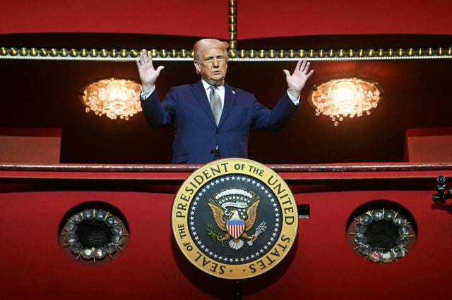 US President Donald Trump stands in the presidential box as he tours the John F. Kennedy Center for the Performing Arts in Washington, DC, on March 17
