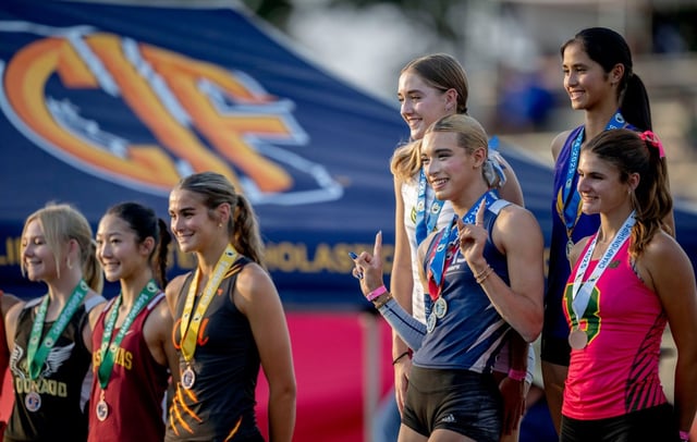 Jurupa Valley’s Ab Hernandez, second from right front, with fellow 1st place finishers Long Beach Poly’s Jillene Wetteland, behind and Monta Vista’s Lelani Laruelle, top right while on the podium with fellow champions in the high jump during the CIF State Track and Field Championships on Friday at Buchanan High in Clovis on Saturday, May 31, 2025. (Photo by Terry Pierson, The Press-Enterprise/SCNG)