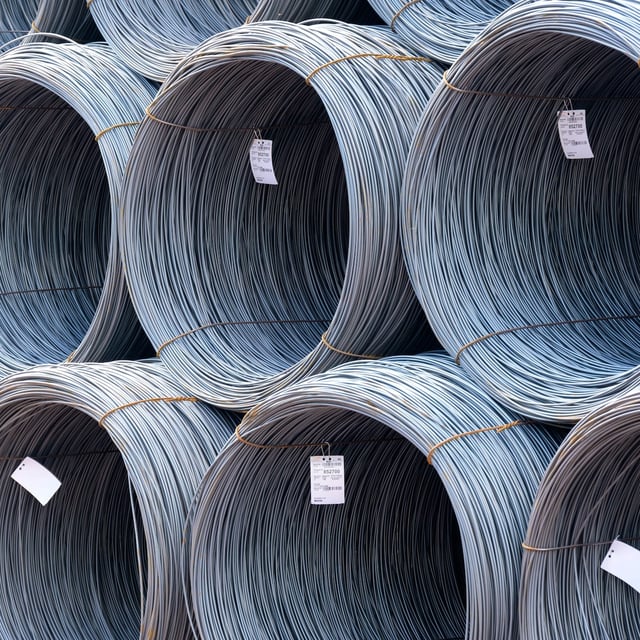 Stacked wire coils on the site of a steelworks of the company ArcelorMittal GmbH.