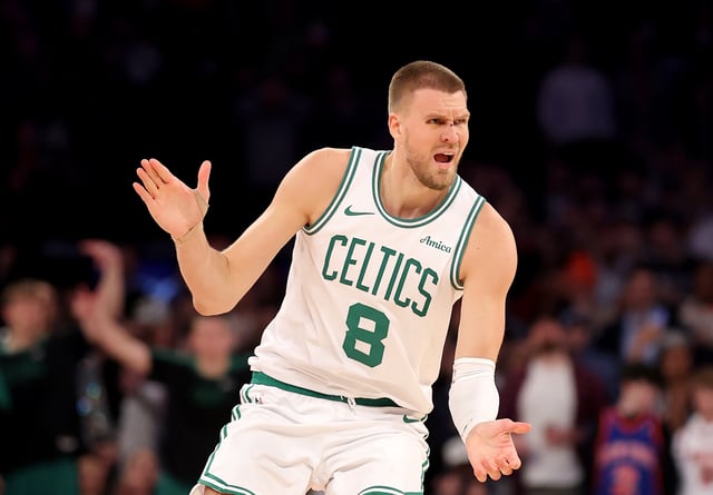 Kristaps Porzingis #8 of the Boston Celtics reacts after his three point shot in overtime against the New York Knicks at Madison Square Garden on April 08, 2025 in New York City.