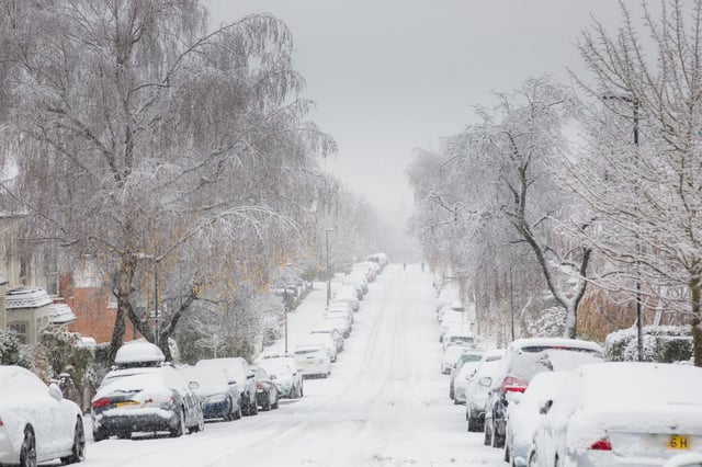 Snow-covered street in London, UK. Credit: Julian Nieman / Alamy Stock Photo