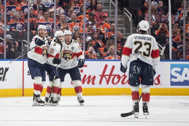 Florida Panthers' Matthew Tkachuk, left to right, Sam Bennett, Nate Schmidt and Carter Verhaeghe celebrate a goal against the Edmonton Oilers during the second period in Game 1 of the NHL Stanley Cup final in Edmonton, Wednesday, June 4, 2025.
