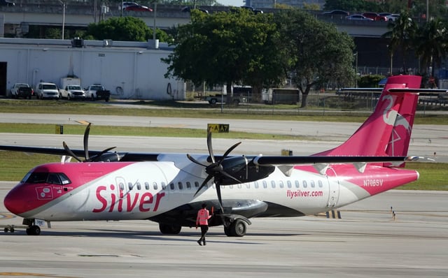 A Silver Airways turboprop is seen on the tarmac at Fort Lauderdale-Hollywood International Airport on Wednesday, May 14, 2025, in Fort Lauderdale, Fla. (Joe Cavaretta/South Florida Sun-Sentinel via AP)